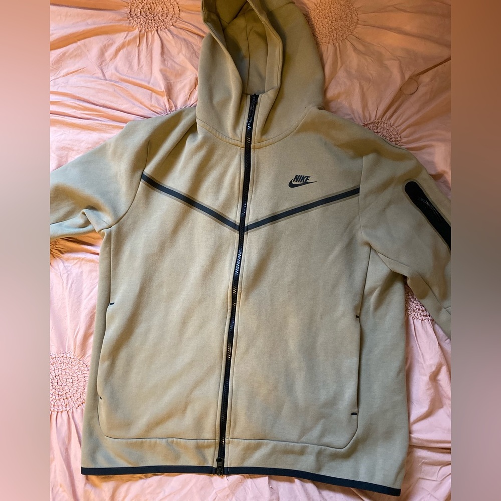 Tan men’s Nike tech. Just doesn’t fit anymore.